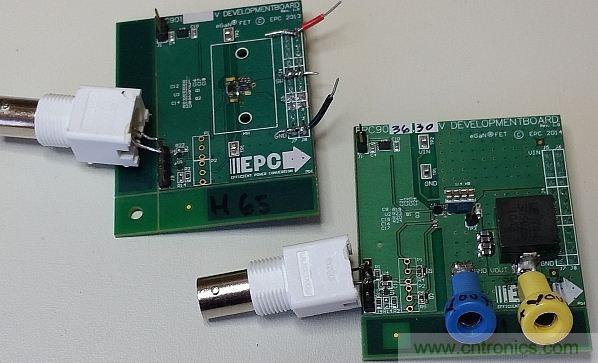 圖1：這裏僅在左側的電路板上配備了半橋配置，右側的電路板配備了完整的DC-DC轉換器。香蕉插座可將測試板連接至電子負載。通過BNC連接器可連接至外部脈衝發生器。